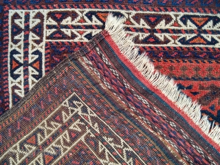 Beautiful Antique Baluch Rug, 39" X 68", complete with original goat-hair side selvages and flat weave ends. The rug appears to have all natural dyes. I counted 7-8 colors; deep indigo, medium  ...