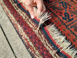 Beautiful Antique Baluch Rug, 39" X 68", complete with original goat-hair side selvages and flat weave ends. The rug appears to have all natural dyes. I counted 7-8 colors; deep indigo, medium  ...