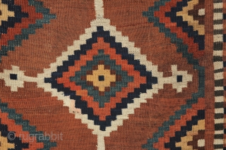 Afshar sofreh with a cross-motif surrounded by an unusual inner border and four step-triangle medallions.  Kirman area, circa the late 19th century. 3-6 x 3-9 ft.      