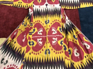Antique 19th century Uzbek silk on silk Ikat Chapan. Beautiful natural colours and beautiful pattern(design). Good condition.                