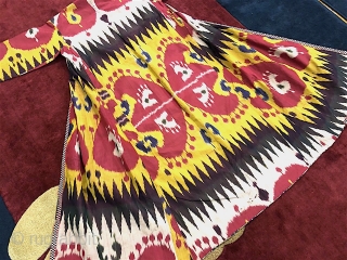 Antique 19th century Uzbek silk on silk Ikat Chapan. Beautiful natural colours and beautiful pattern(design). Good condition.                