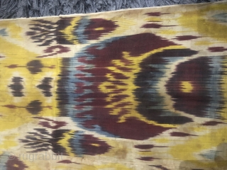 Antique Uzbek silk wrap cotton weft Ikat panel. Good condition natural dyes colours. The size is 65cm by 185cm. Offered reasonable price.           