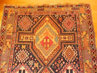 SHIRVAN WITH LARGE SCALE GOLD BORDER AND A DESIGN FILLED WITH FOLK ART ELEMENTS 


SOME  CHEMICAL RED DYE IN THE TWO CENTER MEDALLIONS

JUST WASHED  WITH EXCELLENT PILE    