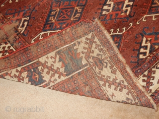 OLD YOMUT YOMUD MAIN CARPET - GREAT SIZE OF 6 X 8 FT - LOTS OF AGE AND LOTS OF WEAR BUT SOLID FOUNDATION- ARCHAIC DESIGN ELEMENTS IN THE BORDER ....  