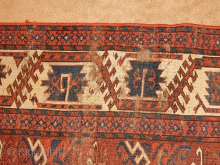 OLD YOMUT YOMUD MAIN CARPET - GREAT SIZE OF 6 X 8 FT - LOTS OF AGE AND LOTS OF WEAR BUT SOLID FOUNDATION- ARCHAIC DESIGN ELEMENTS IN THE BORDER ....  