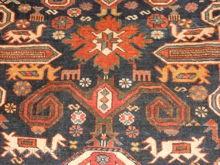 SUPERBLY DESIGNED AND LARGE 55 X 66 INCH KUBA RUG WITH EXCELLENT GLOWING PILE - COMPLETE ORIGINAL  BRAIDED ENDS - WONDERFUL ANIMALS WOVEN HERE AND THERE - 
SEWN TEAR ON THE  ...