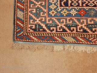 OLD OLD KUBA WITH GREEN BORDER COMPLET KNOTTED ENDS -SOME WEAR -ESTATE RUG 4 X 6 SIZE
ALL NATYRAL DYES - COMPLETE ORIGINAL SIDES AND ENDS - $1600

      