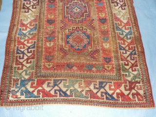 SHIRVAN/SOUTH CAUCASIAN/ MOGHAN  THAT HAS TAPE GLUED TO THE BACK

TO MAKE IT LIE FLAT ON THE FLOOR.

ABOUT 4 X 7 FT.

GOOD OLD NATURAL DYES.

BARGAIN-        