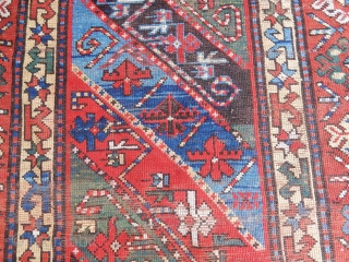 DECORATIVE KAZAK/GENJE CARPET WITH GOOD SIDES AND A BIT OF END LOSS - SIZE IS    4 FT X 9  1/2 FT -   PRICE - $700  