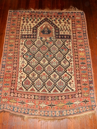 dagestan prayer rug in  superb as found original condition with a 2 headed snake in the prayer mihrab - a  quality village weaving product- 42 x 52 inches   