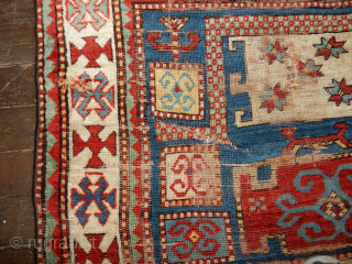 OLD KAZAK THAT NEEDS SOME REPAIRS - VERY GOOD TRIBAL IMAGES TOP AND BOTTOM
VERY GOOD RICH DYES
$1300