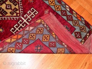 LARGE SIZED YASTIK IN REALLY SUPER NEAR FULL PILE CONDITION WITH FULL KILIM ENDS 
ABRASH NOT NEARLY AS DARK AS PHOTO SHOWS
2 X 3 FT
 
$350       