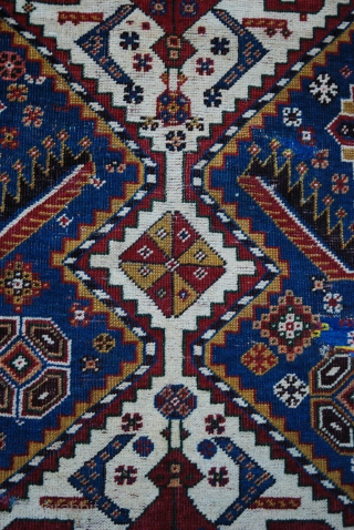A beautiful 19th century Qashqa'i Rug 2.14m x 1.22m (7'x 4')with a number of old re-weaves requiring new restoration. Good natural colours and in overall good condition with some slight wear. Found  ...