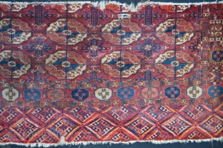 Fragment of a 19th century Tekke Turkmen main carpet 1.91m x 0.81m (6' 3" x 2' 8").                