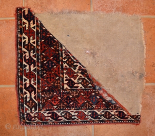 A quarter panel of a 19th century knotted-pile Yomud Turkmen Bokche in very good condition with the remains of its original plain-weave back. The colours are all vegetable.     