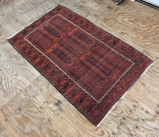 Baluch main carpet in good overall condition - 2.87 x 1.78m (9' 5" x 5' 10").                 