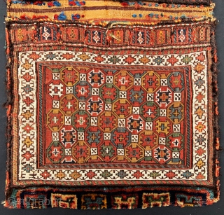 Luri-Bakhtiari khorjin in very good condition, complete with plain-weave back in narrow horizonal bands of colour - 1.02 x 0.56m (3' 4" x 1' 10").        