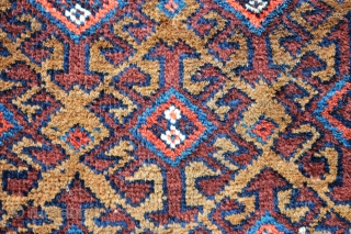 Baluch balisht in excellent condition, complete with plain-weave back - 89 x 43cm (2' 11" x 1' 5").               