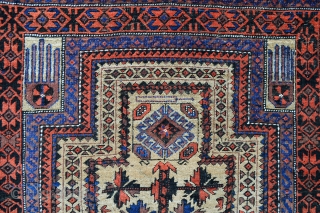 Baluch prayer-rug with natural camel-hair field depicting a stylised 'tree-of-life' in very good overall condition. 1.73 x 0.92m (5' 8" x 3' 0").          