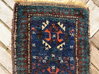 Rare and  beautiful 19th century Timuri namakdan with deep indigo-blue field and a wonderful use of green in the outer  'medakhyl' border. The bag is complete, knotted on both faces  ...