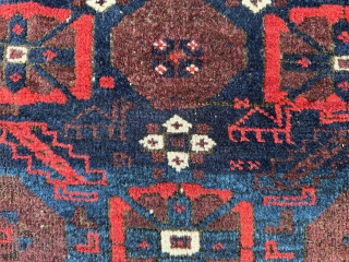 Glowing reds and blues in soft, glossy woollen-pile with stylised camels depicted in the centre of this 19th century bagface made by Timuri tribes. 76cm sq. (2'6" sq.)
Listed on my website www.brianmacdonaldantiquerugs.co.uk  ...