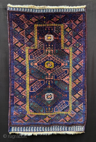 Unusual Timuri prayer-rug with glowing shades of indigo-blue, green and aubergine with highlights of silk and yellow-cotton throughout - circa 1900 and excellent condition. 
1.27m x 0.81m (4' 2" x 2' 8"). 