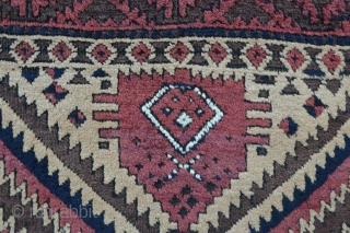 Mushwanni Baluch in excellent overall condition with soft, silky wool, a beautiful old aubergine and incorporating natural camel-hair in the field - 1.65m x 0.87m (5' 5" x 2' 10").   