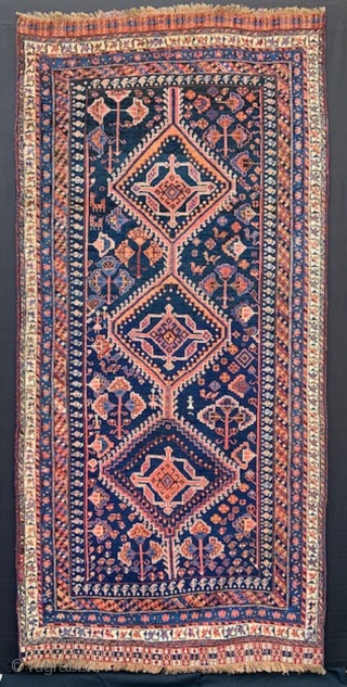 Unusual antique Luri rug of the Hayat Davood region, western Persia, incorporating charming stylized male and female nomads, in very good overall condition.
Size: 2.28 x 1.12m (7' 6" x 3' 8").  