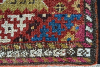 Rare, compartmentalised, small knotted-pile mid 19th century Qashqa'i rug in poor condition with various old reweaves but incredibly beautiful and collectable. Age is difficult to determine but this rug has a very  ...