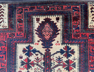 A lovely, small Baluch prayer-rug with natural camel-hair ground comprising a tree-of-life.
In very good condition and complete with plain-weave skirts.
1.42 x 0.76m (4' 8" x 2' 6").
Contact at:- brianmacdonaldrugs@gmail.com    