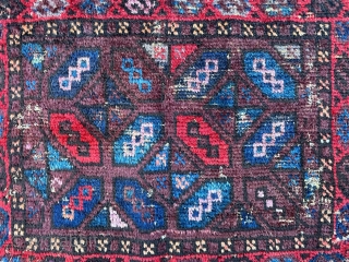 Early Baluch bagface with beautiful use of aubergine and light-blue.                       