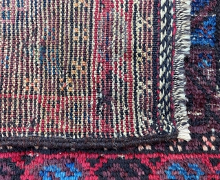 Early Baluch bagface with beautiful use of aubergine and light-blue.                       