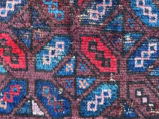 Early Baluch bagface with beautiful use of aubergine and light-blue.                       