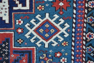 Antique east Caucasian Lesghi rug with aqua-marine field (not blue) in good overall condition 1.42m x 1.04m (4' 8" x 3' 5").           