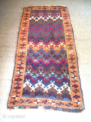 19th century East Anatolian Rug in original condition, 72" x 34: A classical stepped design format found exclusively in Eastern Anatolia; a complete example in very good pile, with good colors and  ...