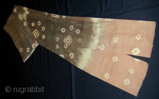 Toraja Ceremonial Banner (Shown folded in half). Natural colours, pelangi (tie-dyed). Sulawesi, Indonesia. Very good condition. 371 x 86 cms. First half, 20th c.         