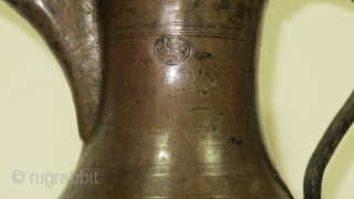 Brass Dallah. Syria, Circa 1900. H = 20 cms


 A rather interesting coffee pot. This is the first dallah we have acquired/seen with a Greek Orthodox (or possibly Assyrian) maker's seal. The  ...