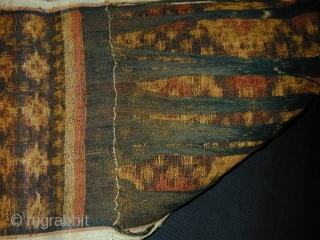 Balinese Double-Ikat Ceremonial Breastcloth (Kamben Geringsing). Tenganan Village. Natural colours. 97 x 23 cms.                   