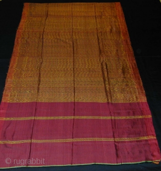 Cambodian Silk Ikat Sampot Hol. Circa 1900. Very good condition and excellent colours. 87 x 330 cms.                
