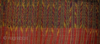 Cambodian Silk Ikat Sampot Hol. Circa 1900. Very good condition and excellent colours. 87 x 330 cms.                