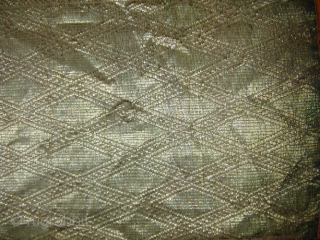 West Sumatran Gold Brocade Cloth. 19th Century. 'Kain Sandang' - part of a ceremonial headgear or shouldercloth. Minangkabau people. Gold, silk, cotton thread - supplementary weft weave. 37 x 20 cms.  