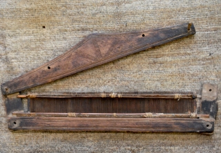 Two Mazandaran jajum-combs. Probably early 20th. Small 56 x 20 cm. Larger 71 x 20 cm. Carved wood and reed. These combs were opened from the upper side, inserted into the warps  ...