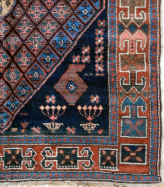 Sonqor Kurdish with a bold border and quite a tribal character. Ca. 1920, 136 x 160 cm. (4'6" x 5'4"). This rug with its squarish size and concentric design could have been  ...