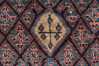 Sonqor Kurdish with a bold border and quite a tribal character. Ca. 1920, 136 x 160 cm. (4'6" x 5'4"). This rug with its squarish size and concentric design could have been  ...