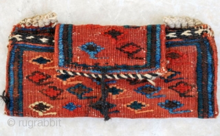 Afshar "tutundan" (tobacco/opium pouch), 26 x 18 cm (11" x 7") with opened flap. All wool in very good condition.             