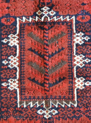 Baluch rug, East Persia, ca. 1900. 117 x 225 cm. Warm saturated red. High pile except for the corroded black, Some repiled black. Very good condition in general.     