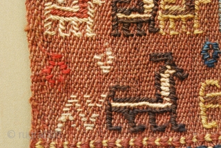 Antique small Qashqai bag, 30 x 25 cm. All wool. Slightly weak texture upper right corner. sewn on canvas and framed with massive hard wood. Could be easily detached and sold alone. 