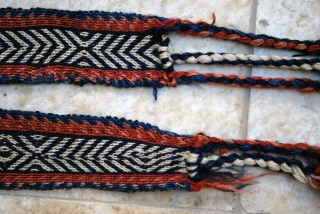 Bakhtiari pack-band, all wool, early 20th c. 8 x 328 cm. Good condition in general. One small braided rope missing at one end.          