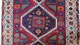 East Anatolian, early 20th c. 123 x 210 (4"1' x 7'). Uneven corrosion of ground color. Small repiled areas, small reweave at upper end (braid), secured at lower. Original selvages.   