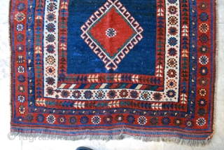 Luri rug, 1st quarter 20th c, 110 x 192 cm. Small repiled spots in field, slight wear to center, otherwise high pile in general with original sides. Wool on goat hair.  